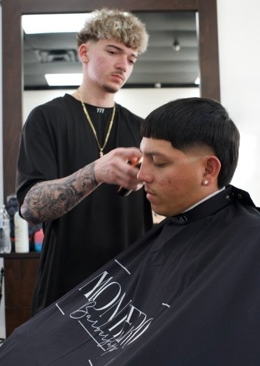 Modern mullet haircut with side fades